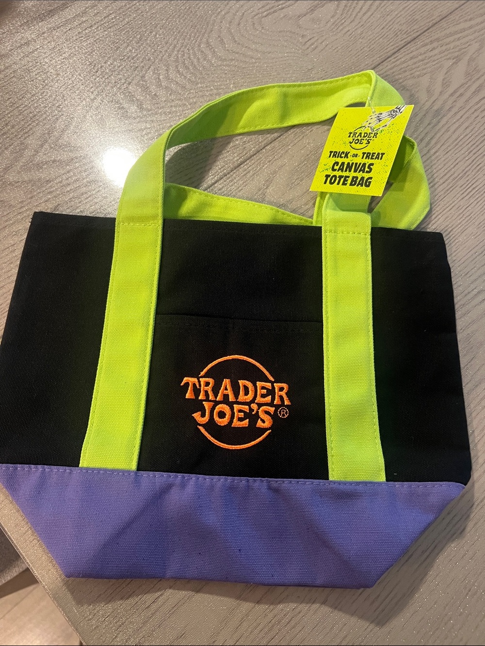 Trader Joe's Black Canvas Tote with Neon Green Straps and Purple Base